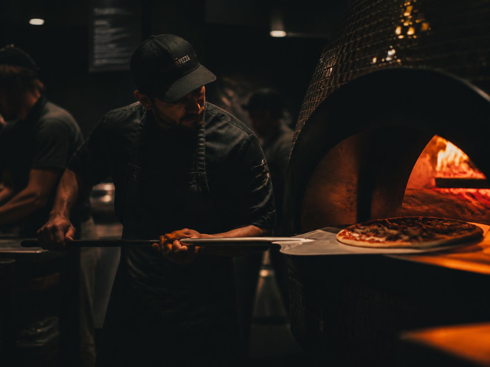 Kitchen team working the line during a busy dinner service
